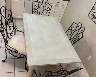 #1	Breakfast Table - Glass protect with tile top. 4 Metal Scroll Chairs with cream upholstery (heavy) 48.5x30x30	 $ 100.00 																												