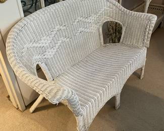 #55	White wicker love seat - (no cushions) 50"	 $ 40.00 																												