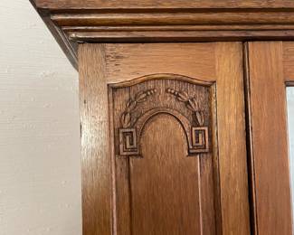 #8	Antique Armoire Carved wood with full length beveled mirror, hanging rack and pegs. 1 door. 33.5w x 15.5d x78h ( as is wear and door sticks)	 $ 125.00 																												