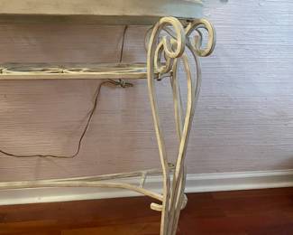 #40	Distressed Cream Iron base w/beveled glass top, half moon shape entry table. 46x20x28	 $ 75.00 																												