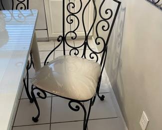 #1	Breakfast Table - Glass protect with tile top. 4 Metal Scroll Chairs with cream upholstery (heavy) 48.5x30x30	 $ 100.00 																												