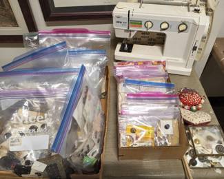 Buttons; Elna sewing machine.