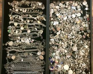 Vu=intage sterling charms and bracelets.