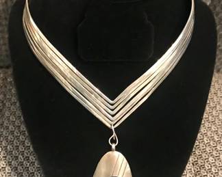 Sterling silver and turquoise Navajo shadowbox necklace.