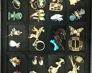 Vintage costume brooches and pins.