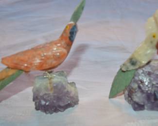 Carved stone birds on Amethyst