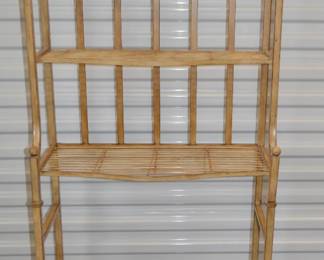 Behind the toilet organizer 