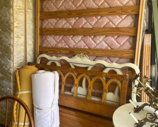 Several beds and frames