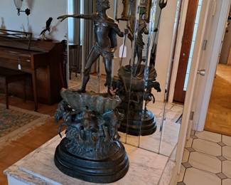 Large statue of a human figure and animals