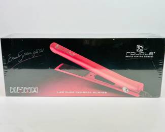 Designed in an elegant rose-gold finish, the Royale 1.25" Pure Ceramic Plate Flat Iron uses true ceramic plates to ensure even heat distribution, minimize frizz, and create smooth, salon-level styling at home. 