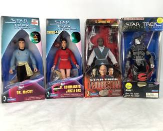 Four (4) Star Trek figures, including Borg, box dated 1995, Lt. Commander Worf, Lt. Commander Jadzia Dax, and Dr. McCoy, dated on the box 1998. Appears to be new in the box. 