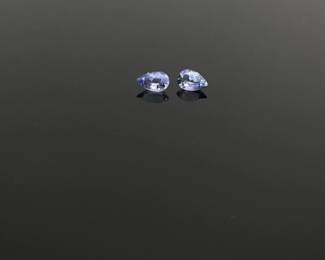Two (2) pear cut tanzanite gemstones. Each approximately 0.22 ct and 4.8 mm x 3 mm. 
