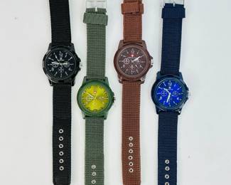 Three (3) new Gemius wristwatches, blue/black/brown (1) has a stainless steel back, and (1) Swiss Army watch, # 577-1, with a green case and green canvas strap. All watches are untested. See photos for detail. 