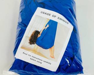 Indoor sensory swing, made of blue nylon, great for sensory play, untested. The hanging hardware is not included. 