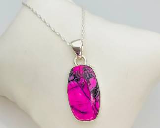 Cherry Blossom Dahlia 1" pendant on 22" silver chain, stamped "925". 5.25 gtw. 