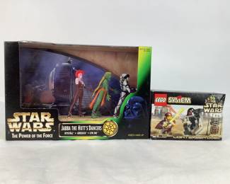 In this lot, you will find a Lego Star Wars Lightsaber Duel building set with (50) pieces and a Star Wars Jabba the Hutt's Dancers Action Figure set.