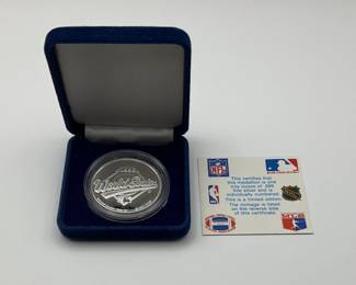 
Limited edition 1992 World Series silver medallion with certificate of authenticity. .999 silver. World Champions Toronto Blue Jays on reverse. Presented in a blue velvet case. 
