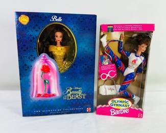Disney's Signature Collection Belle Doll from Beauty & the Beast, new in box, and Barbie Olympic Gymnast, new in box. The box is damaged at the top corner. See photos for details.