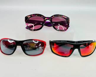 Two (2) pairs of Pugs sunglasses, style # F8 & #PR2. Ultraflex temple & polarized anti-glare protection on #PR2. One unnamed pair of sunglasses is also included. See photos for detail. 