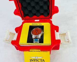 Invicta Men's Wristwatch, model: 19443, water resistant, stainless steel with orange dial. The watch appears new in box. 