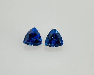 Two (2) trillion cut sapphire gemstones. Each 5.9 mm. 2.10 ctw.