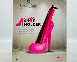 Royale Cinderella Shoe Holder in Hot Pink, a heat-resistant, high-heeled–shoe–shaped stand that securely holds flat irons, curling irons, and other hair tools while adding a fun, fairytale touch to your styling space.