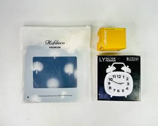 Hofdeco pillow case, H 17 1/4" x W 17 1/4 with (4) tassels, String Light fairy lights (3) in box, untested & LY Fashion Clock, battery operated, untested. Items appear new. 
