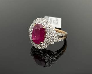 Platinum two-tone size 6.75 ring featuring a 3.37 ct GIA certified Burmese ruby mounted at the center. (84) round cut diamonds, 1.04 ctw, surrounded the center stone. 7.9 gtw. Includes appraisal dated October 14, 2025 by GemAssure Gemological Appraisals.