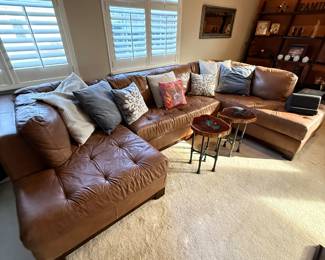 Leather couch. Size 11’8” x 7’1”. Short arm is 5 feet