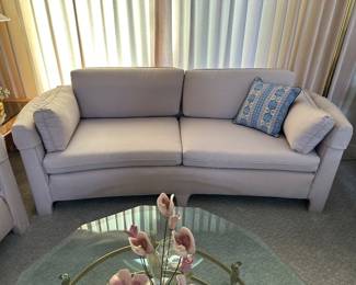 Curved front sofa, matches love seat, both are pristine