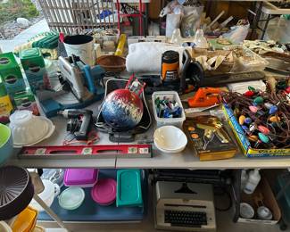 IBM dinasour, bowling ball, Christmas lights, level, miracle gro, Worx chain saw, Ryobi saw