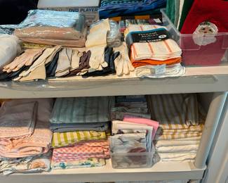 Bath towels by the dozens and sheets and pillowcases king size also double size which are hard to find these days. Some are new in package.