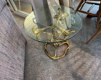 High quality, thick glass top side table with Gilded Lilly base is 20 inches diameter