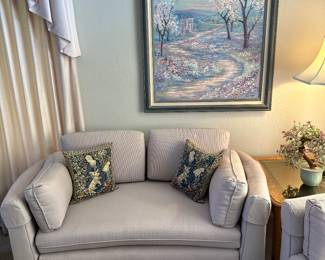 Pristine loveseat, matches sofa with super designer curved front and notice the oh-so 80s artwork one of many hand painted originals 