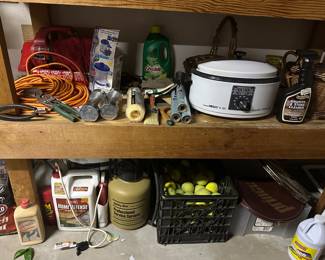 Gardening items, box of dog tennis balls, 6 quart roaster oven, tennis rackets , 