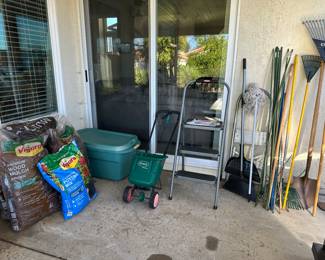 Yard, tools, bark chips, potting, soil seed, spreader, stepstools