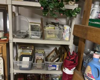 Frames of all sizes and styles plus plenty of new Christmas wrapping plus tea kettle and Luggage, etc.
