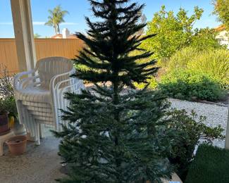 Easy put together Tree great for ornaments, metal arms pop into center stem, 6+ feet tall