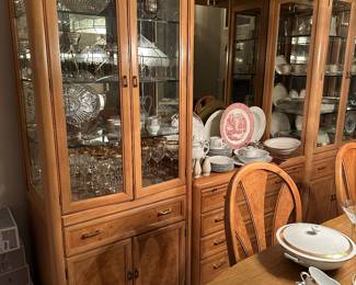 One of two Thomasville China, cabinets with storage below and matching buffet can be used with or without mirror back and lighted top bar