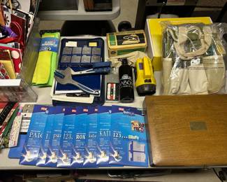 QuicKutz personal die cutting system with notebook full of dye cutters the tool eight packets of new dry cuts, and texture plates all included