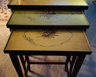 Vintage three tiered nesting tables.