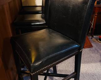 Set of three bar stools. 