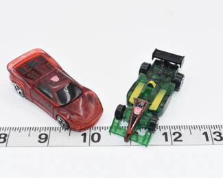 A Pair of Transformers Robots in Disguise Spy Changers