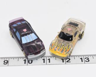 A Pair of Transformers: Robots in Disguise (RID) Spy Changers, Hot Shot (Stealth Mode) and Super Artfire