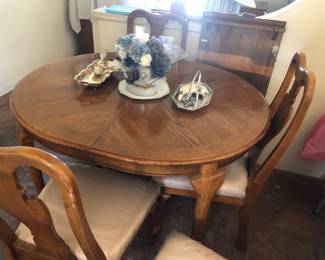 Vintage wood dining room table with one leaf and 6 chairs