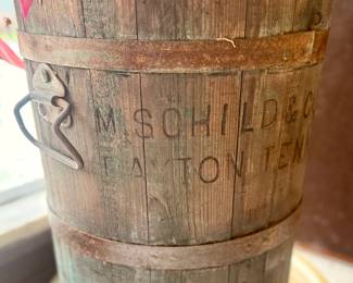 M. Schilde & Company, a manufacturer based in Dayton, Tennessee, active in the late 19th to early 20th century. They were known for hand-cranked wooden ice cream freezers, churns, and coopered household goods.

Keywords: Antique ice cream churn bucket, Wooden ice cream maker, M. Schilde & Co Dayton Tennessee, Primitive rustic bucket, Vintage coopered barrel, Farmhouse kitchen décor, Country rustic antique, Americana kitchenware, Early 1900s ice cream freezer, Antique wooden barrel planter, Rustic farmhouse décor, Cabin lodge décor, Industrial vintage, Southern Americana, Repurposed planter, Country cottage style, Barn find décor, Tennessee antique, Iron banded wood, Original patina, Handcrafted wood staves, Weathered character, Folk industrial charm
