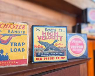 Vintage Winchester & Peters Shotgun Shell Boxes
A vibrant trio of classic mid-century ammunition boxes featuring highly collectible sporting graphics. Includes Winchester Ranger Trap Load and Peters High Velocity & Victor Red Label 12-gauge boxes—excellent display pieces for a lodge, gun room, or Americana collection. Strong colors, great imagery, and authentic sporting history all in one lot. Perfect for collectors of vintage ammo advertising.
