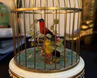 Vintage singing birds in cage.  Wind up 
