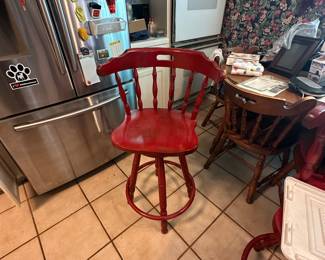 Kitchen - 2 miscellaneous wooden chairs - refrigerator and magnets, table & set of chairs to match in back of picture