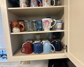 Coffee cups in cabinet, coffee pods for Keurig